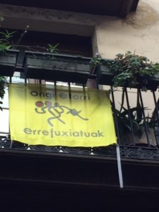 Basque language flag welcomes refugees