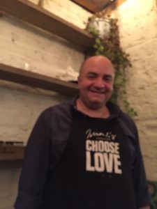 Imad welcomes guests to Imad's Syrian Kitchen