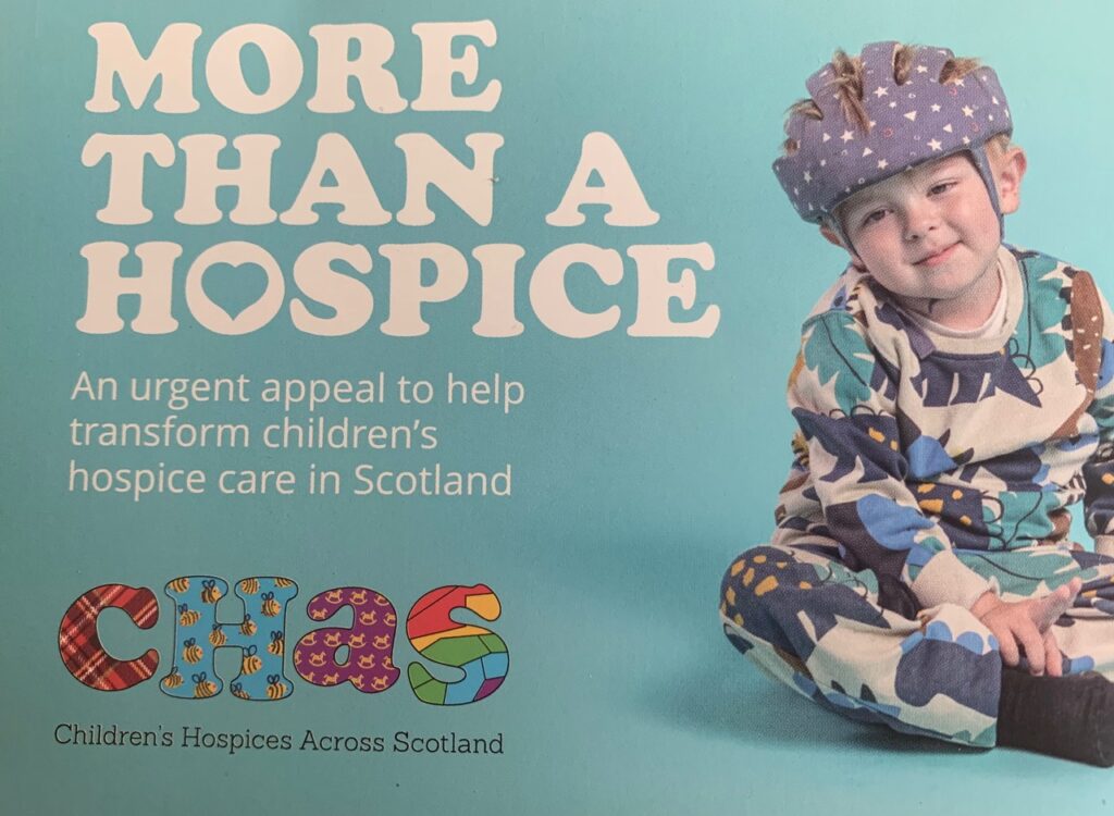 A smiling child on the  CHAS More than a Hospice appeal 